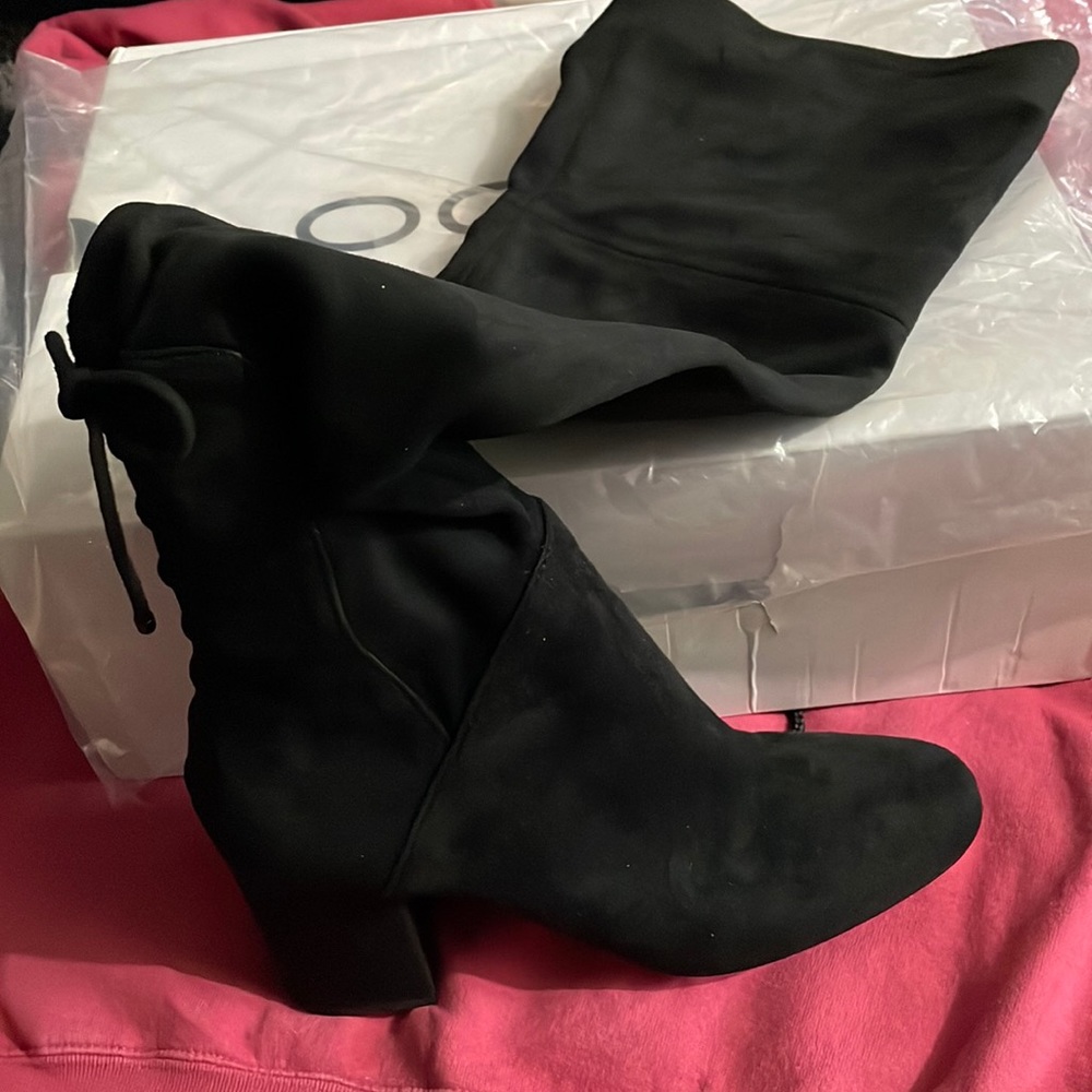 Black above the knee boots